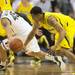 Michigan sophomore Trey Burke steals the ball from Michigan freshman Denzel Valentine during the first half at Breslin Center in East Lansing on Tuesday, Feb. 12. Melanie Maxwell I AnnArbor.com